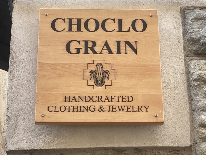 Beech shop sign made for Choclo Grain, a clothing and jewellery shop